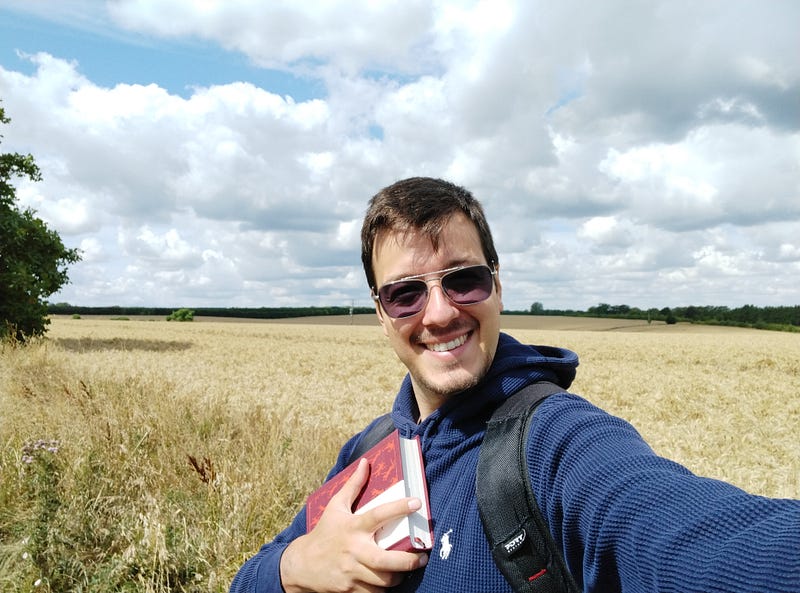 Antonello Mirone ( Art Historian) in the countryside of Canterbury (Kent, UK,2023). Holding a copy of Dante’s Inferno.