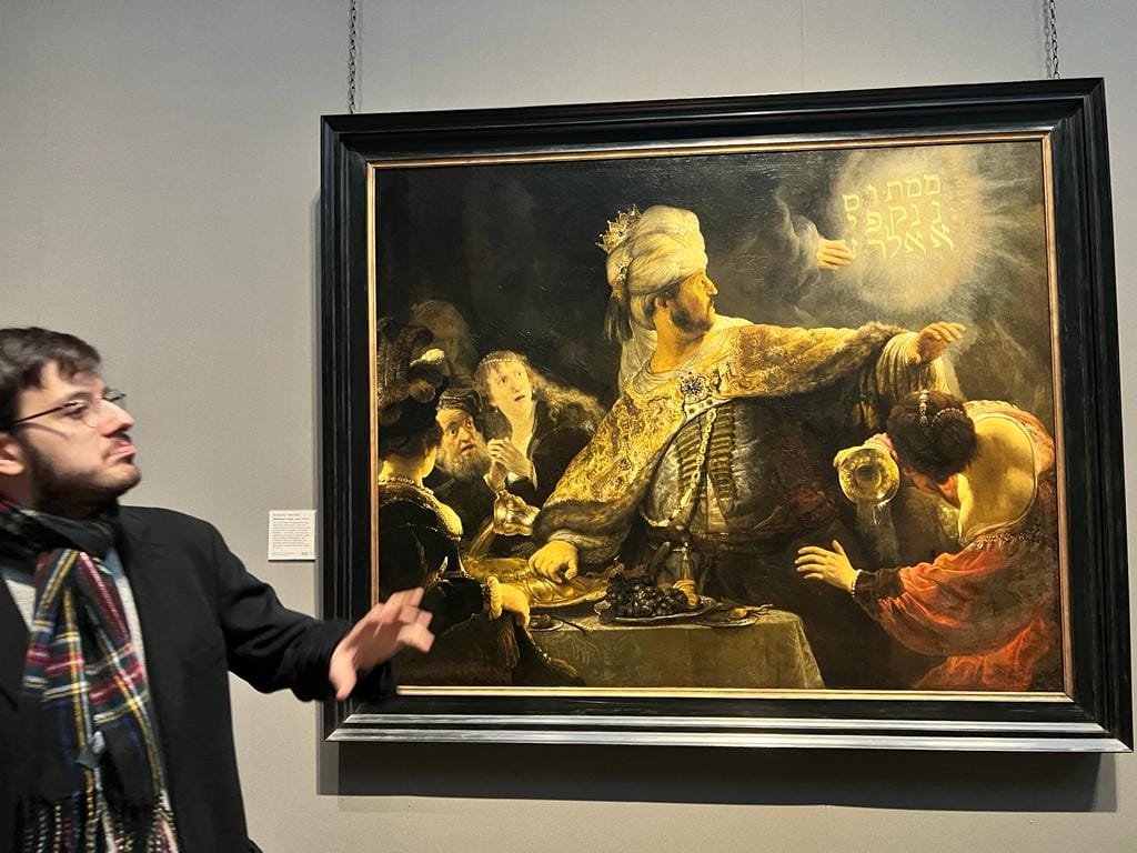 Antonello Mirone (Artist, Historian) next to Belshazzar’s Feast by Rembrandt, c.1635-1638, National Gallery, London