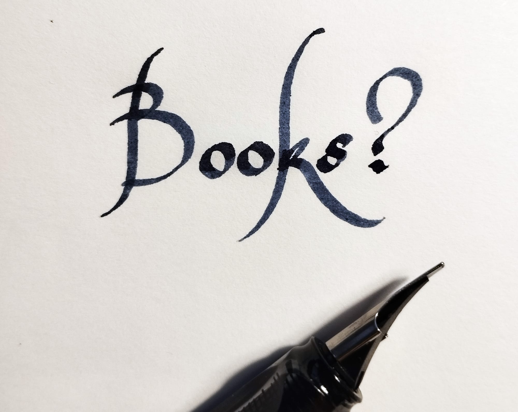 "Books?" written with some calligraphy practice using a Lamy Pen 